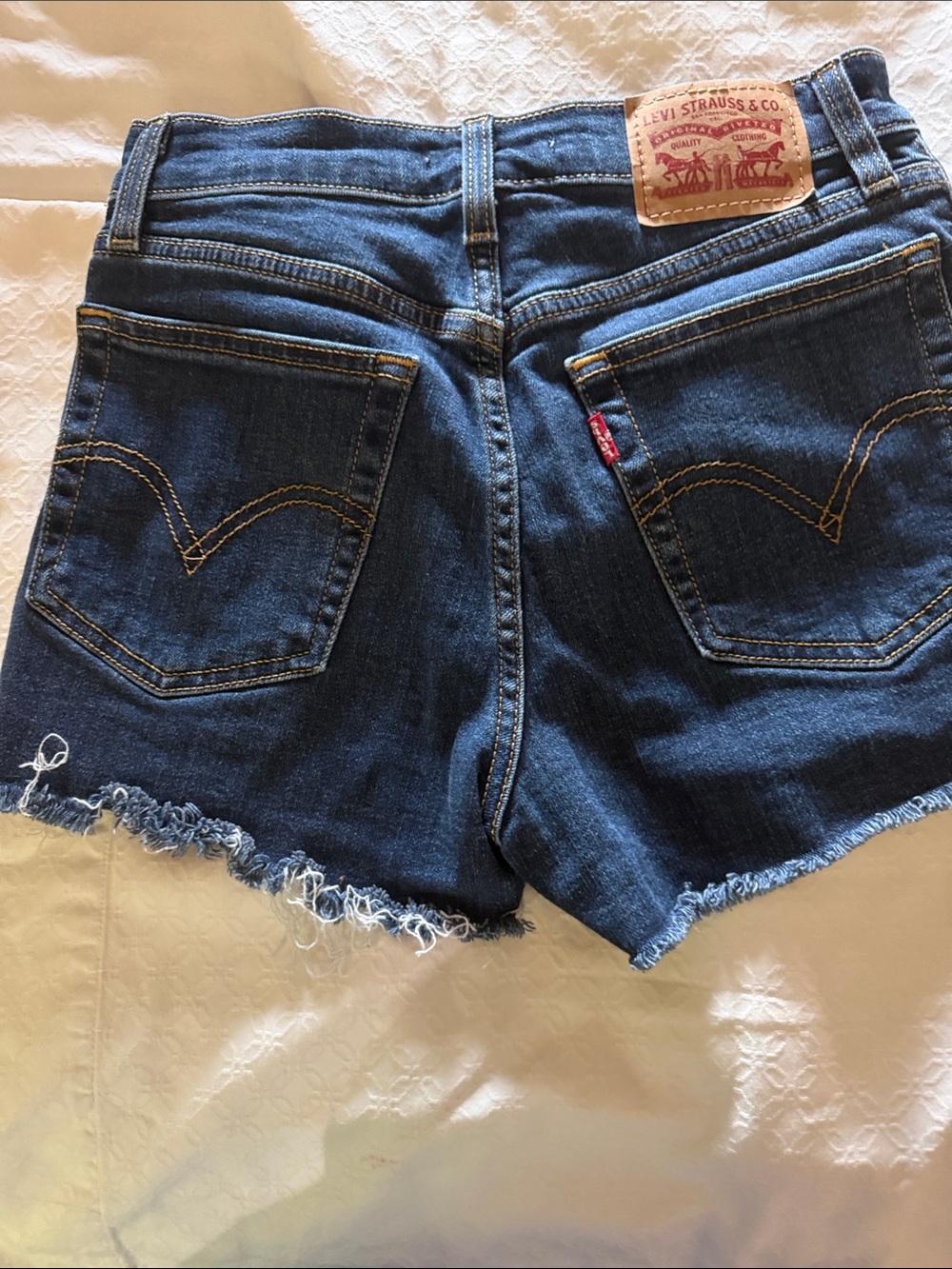 Levi's Dark Blue Denim Cutoff Shorts with Frayed Hem - Picture 4 of 5